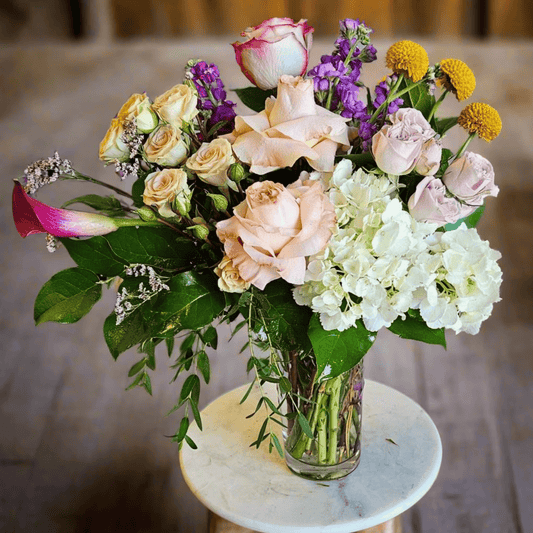 Handcrafted floral bouquet from Rose & Thorn Florist, available in multiple sizes including Standard, Deluxe, and Premium. Fresh flower delivery in Scottsdale, Paradise Valley & Phoenix.