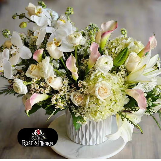 Handcrafted floral bouquet from Rose & Thorn Florist, available in multiple sizes including Standard, Deluxe, and Premium. Fresh flower delivery in Scottsdale, Paradise Valley & Phoenix.