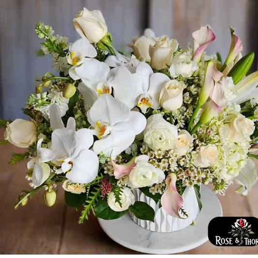 Handcrafted floral bouquet from Rose & Thorn Florist, available in multiple sizes including Standard, Deluxe, and Premium. Fresh flower delivery in Scottsdale, Paradise Valley & Phoenix.