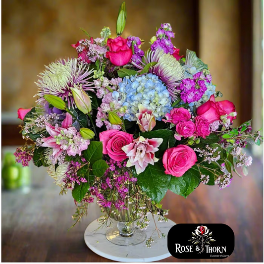 Handcrafted floral bouquet from Rose & Thorn Florist, available in multiple sizes including Standard, Deluxe, and Premium. Fresh flower delivery in Scottsdale, Paradise Valley & Phoenix.